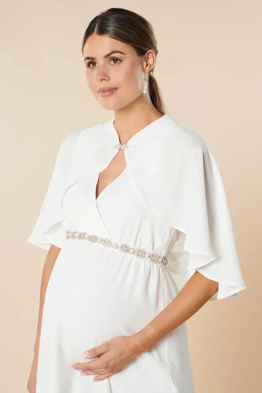 Bridal cape with jeweled clasp
