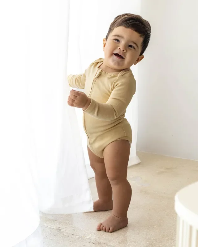Long Sleeve Zipper Bodysuit In Latte, 3-6m