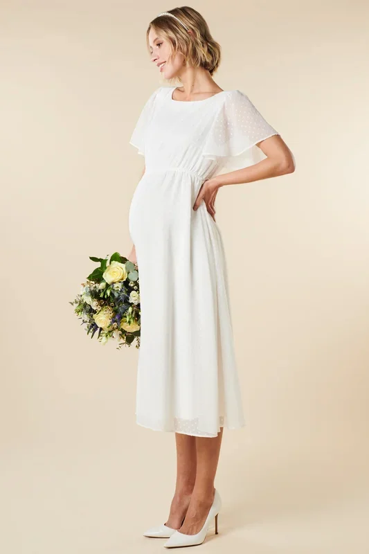 Maternity wedding dress with bow detail on the back