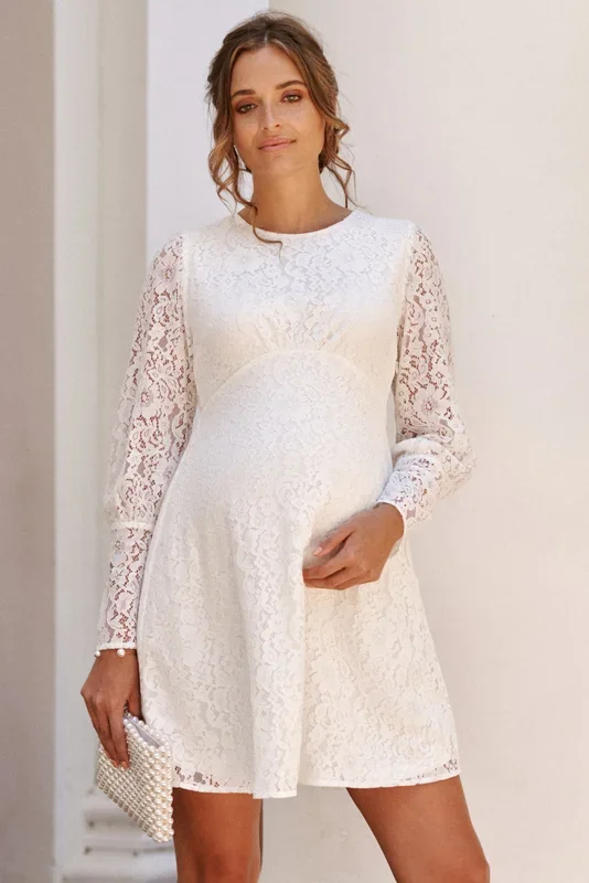 Mini maternity wedding dress made of lace with puff sleeves