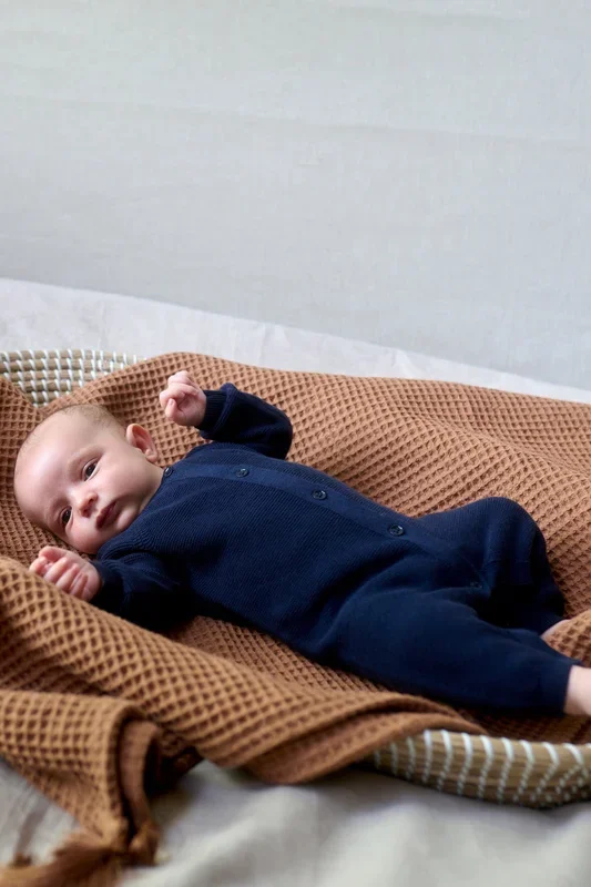 Organic knitted romper with button placket, navy